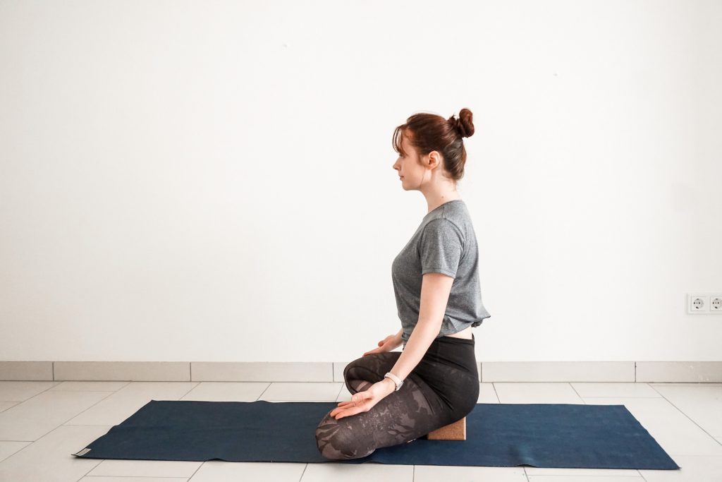 Pretty Girl Sitting in Easy Pose of Yoga with Holding Hands Inside. Stock  Image - Image of holding, hands: 247630663