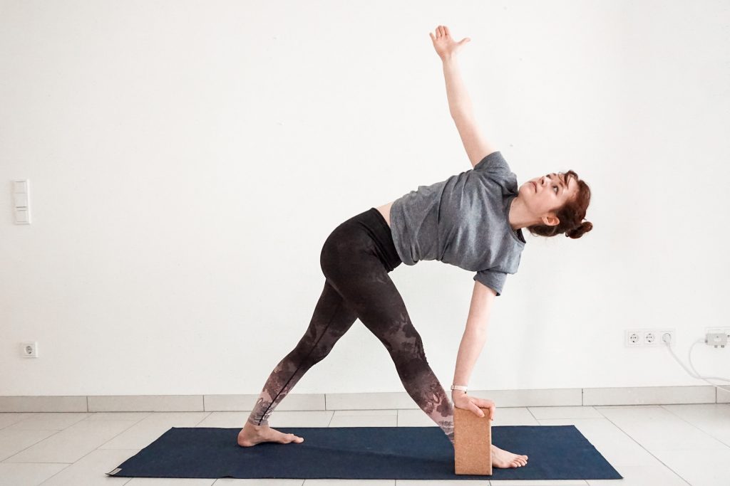 How to use yoga block for beginners in revolved triangle pose