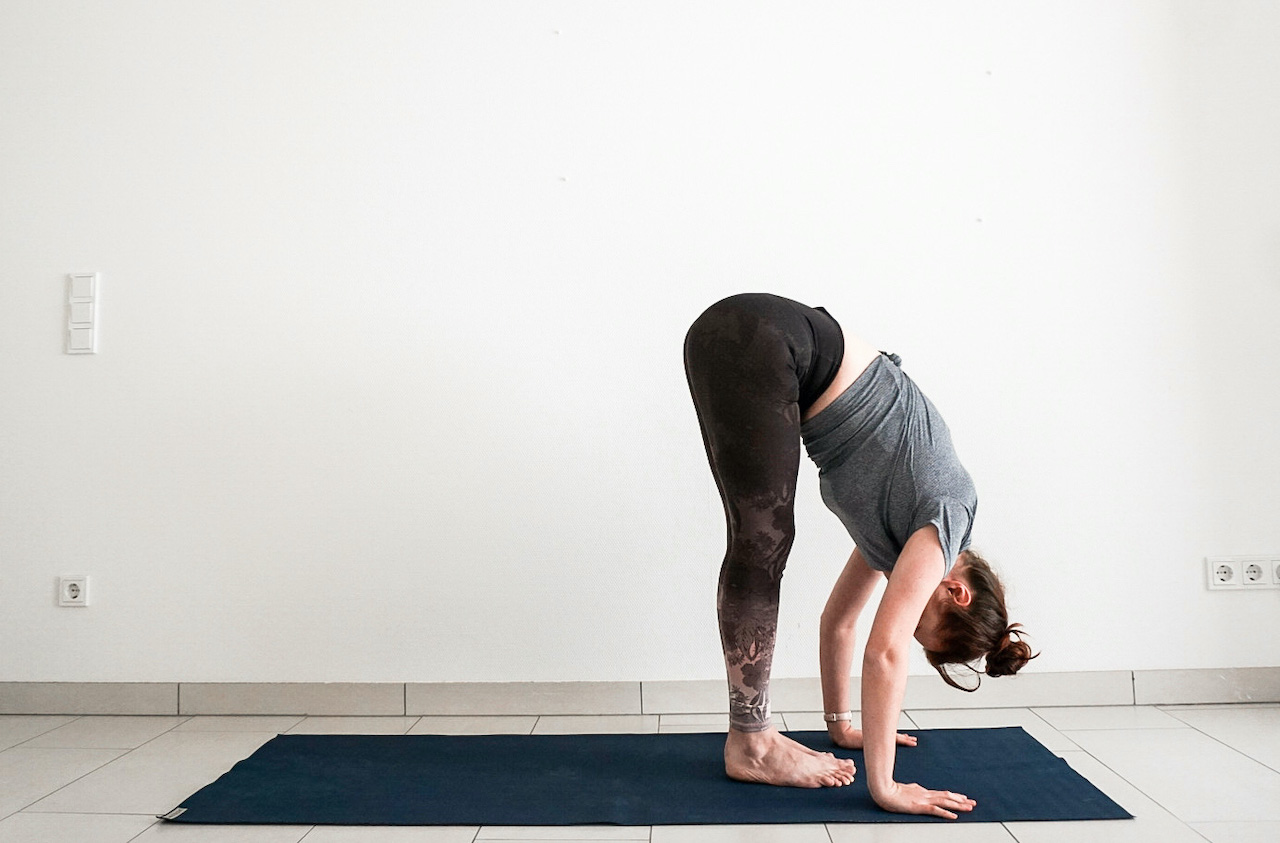 yoga poses for beginners - standing forward bend
