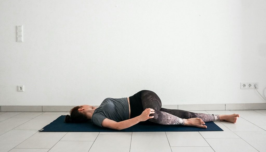 yoga poses for beginners - supine spinal twist