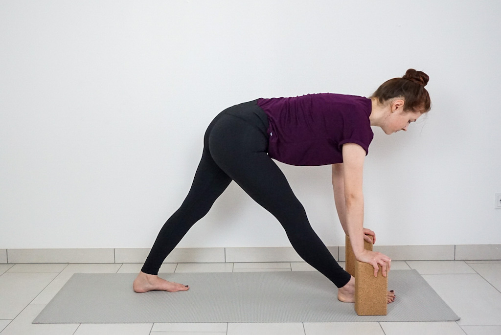 pyramid pose stretch with yoga blocks