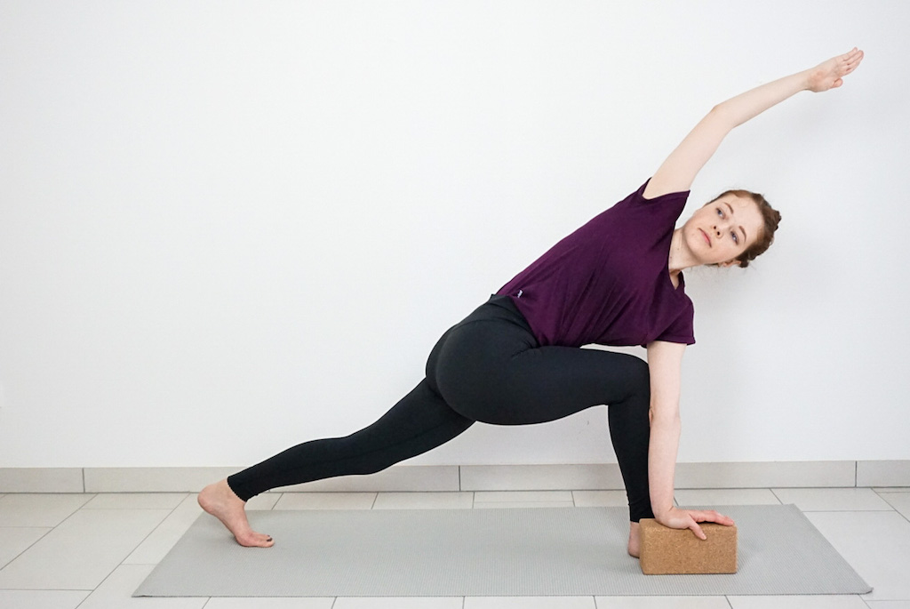 revolved side angle pose with yoga block