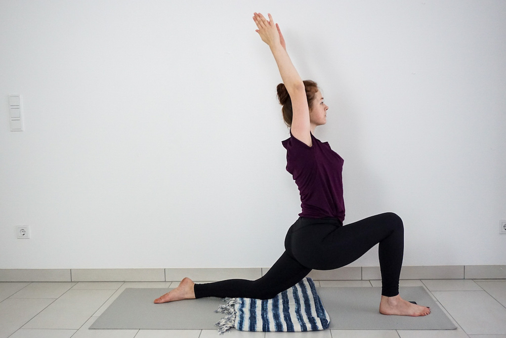 yoga blanket to support knee in low lunge