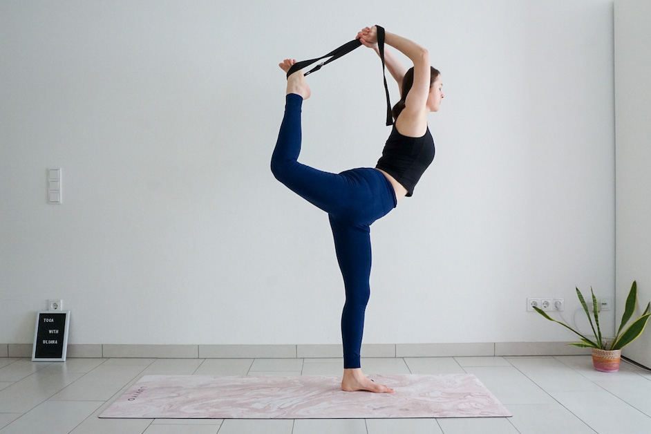 6 Yoga Strap Stretches That Will Soothe Your Muscle Tension