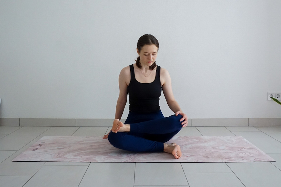 Premium Photo | Woman doing a balancing navasana variation yoga pose or  boat pose to relax and strengthen her abdominals, spine and hip flexors in  a health and fitness concept